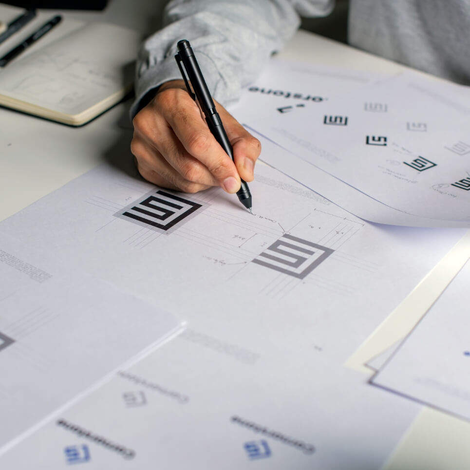 Image showing a close up of a designer working on a logo design